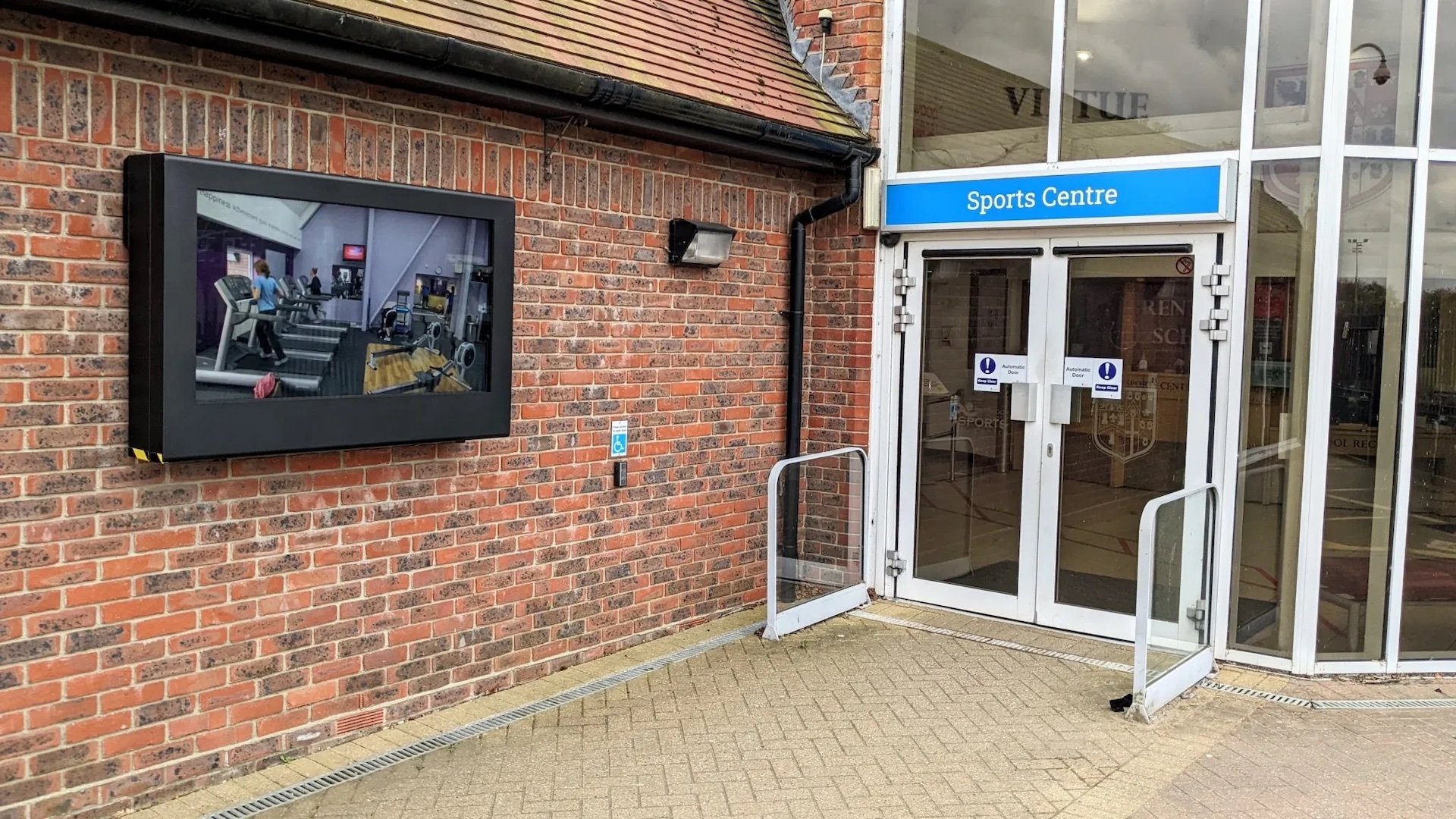 An outdoor digital signage screen outside of Brentwoods sport centre